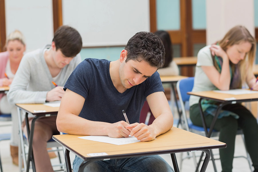 Students taking a test in a classroom in Westchester